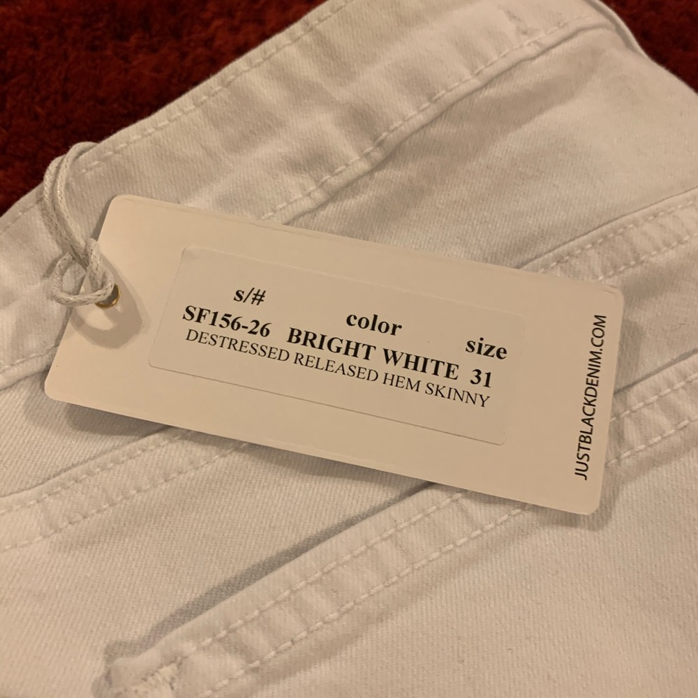 White mid rise skinny jeans